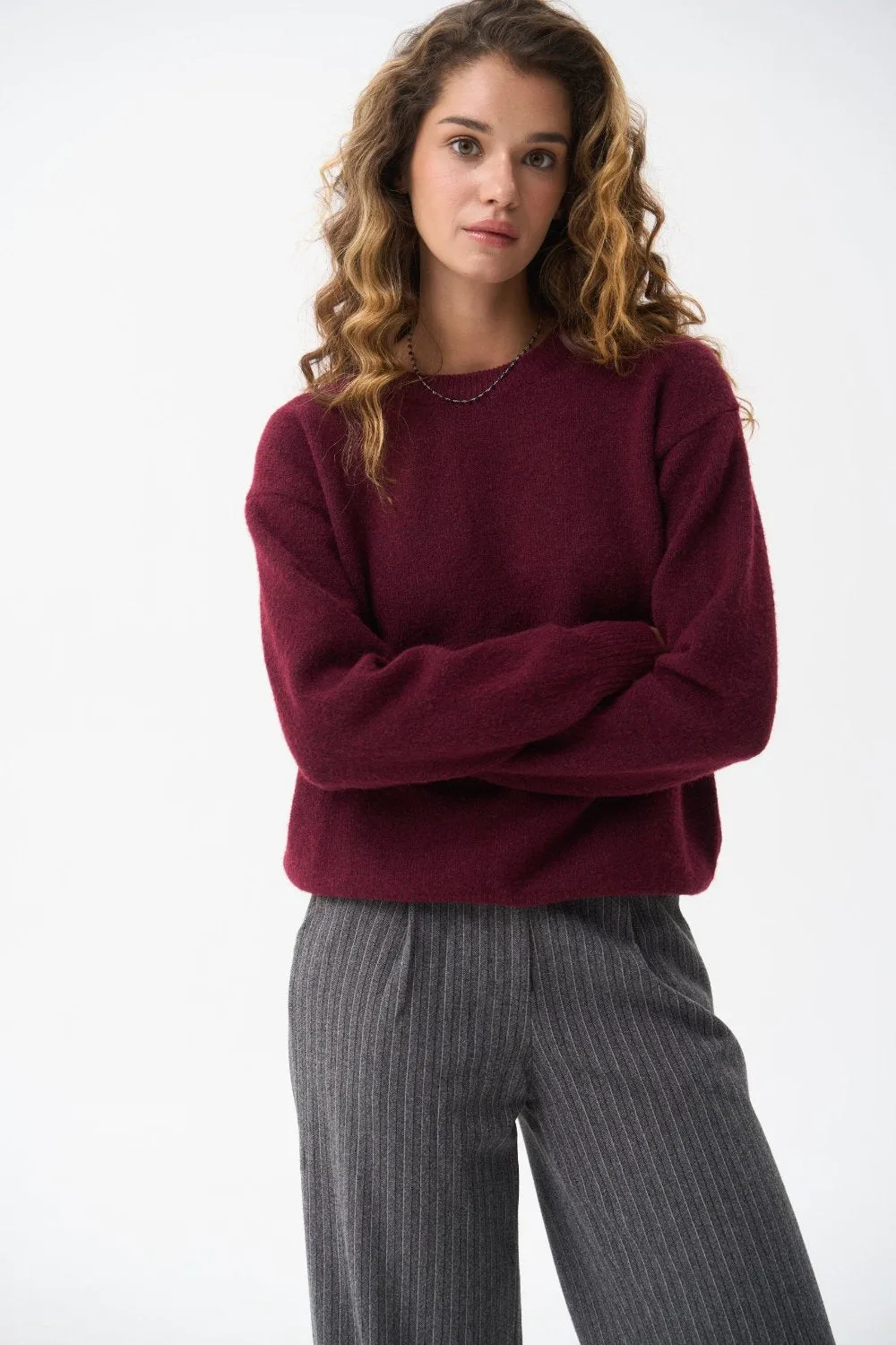 Wool sweater in color red